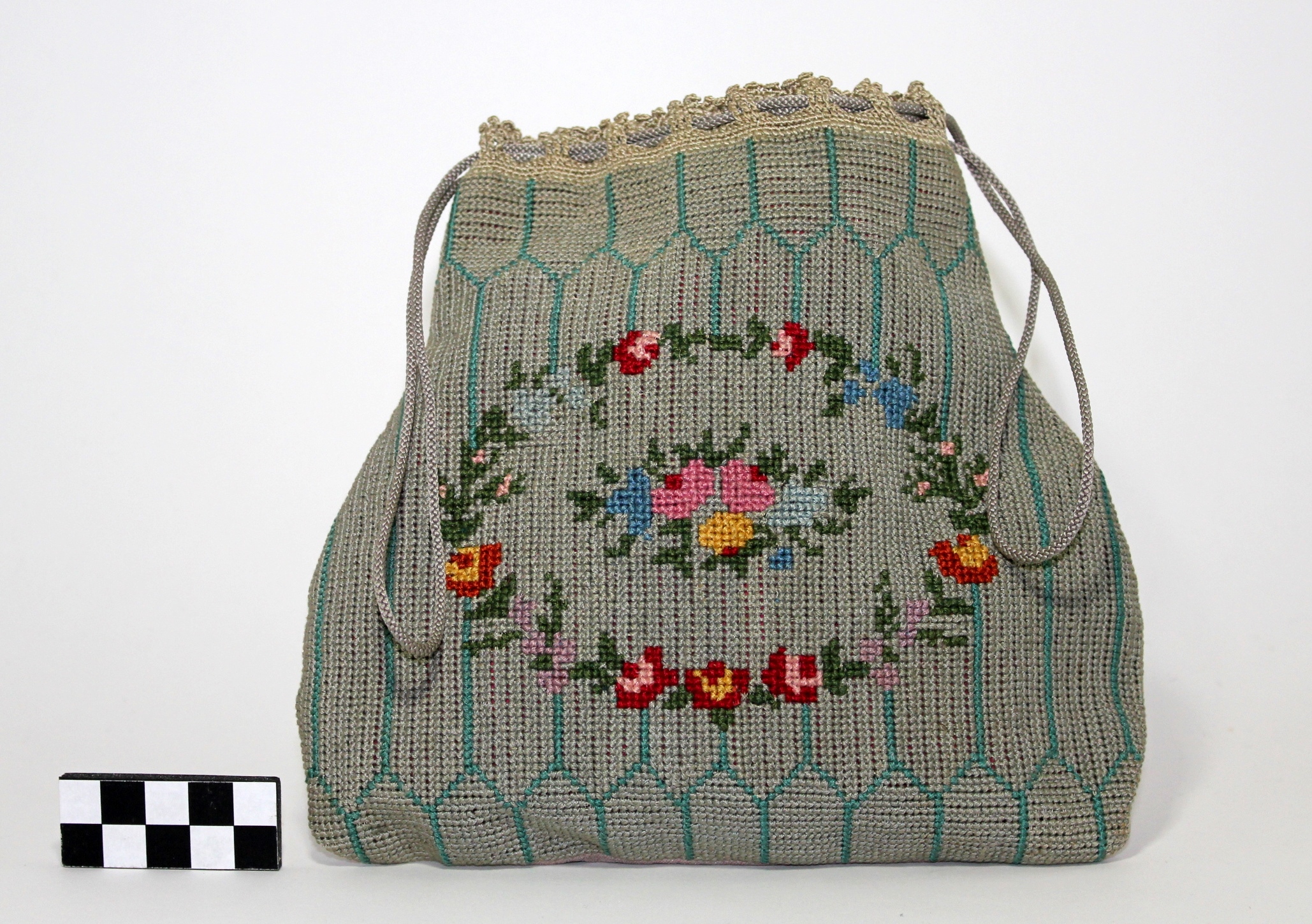 Blue needlework Victorian purse with flower in the middle